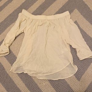 Off the shoulder off white shirt